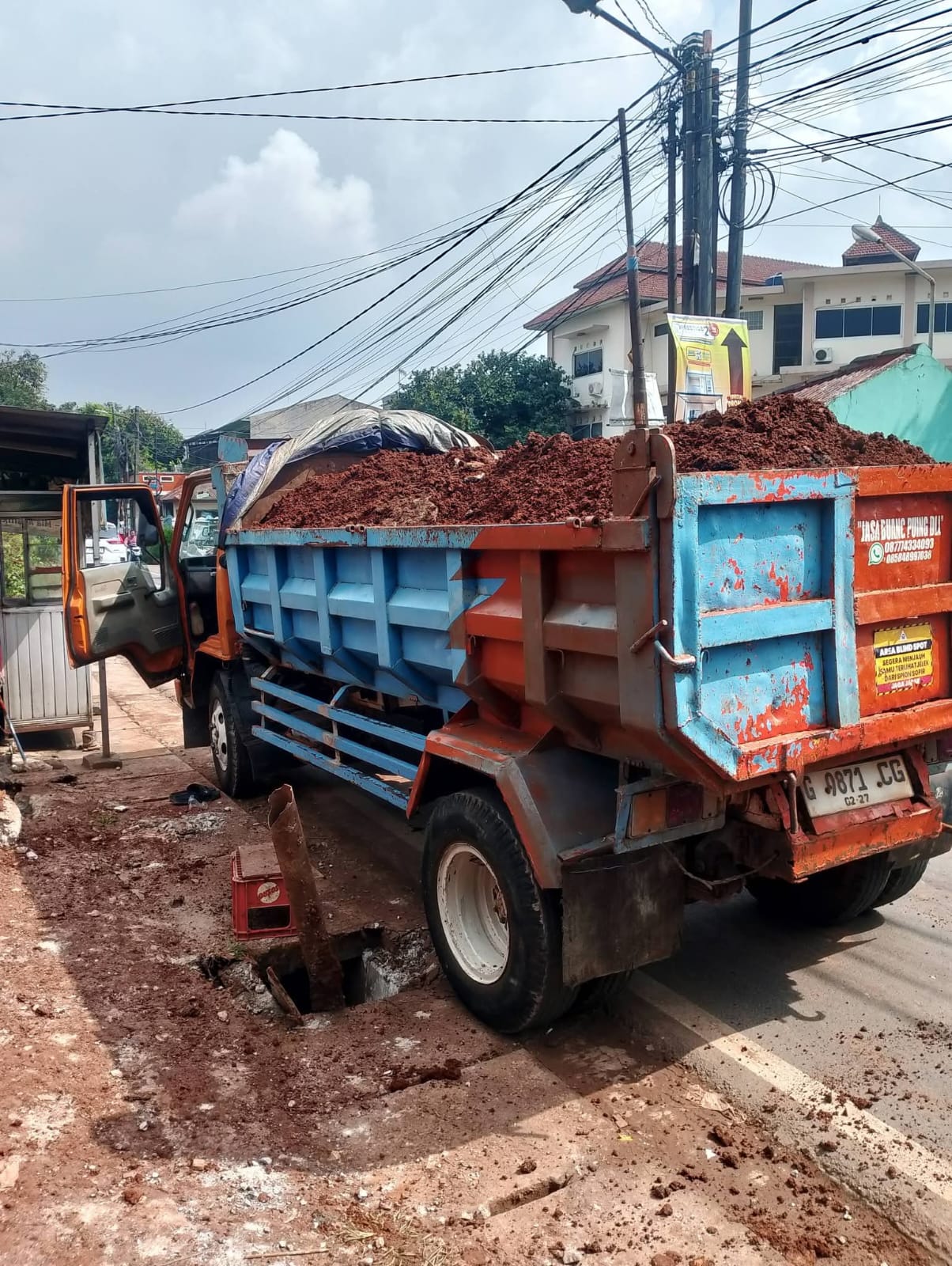 Renovasi rumah di Beji